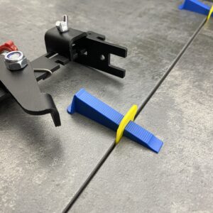 Система вирівнювання плитки